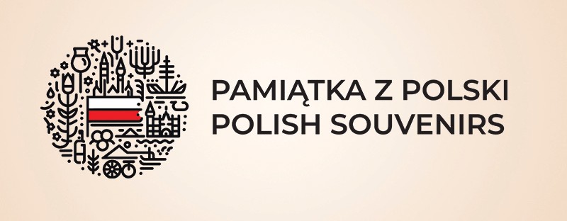 Poziomy baner z logo „Pamiątka z Polski – Polish Souvenirs”: okrągły sygnet z motywami tradycyjnymi i flagą Polski oraz dwujęzyczny napis.